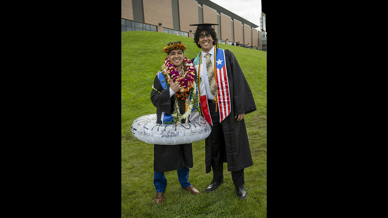 Two students pose for a picture.