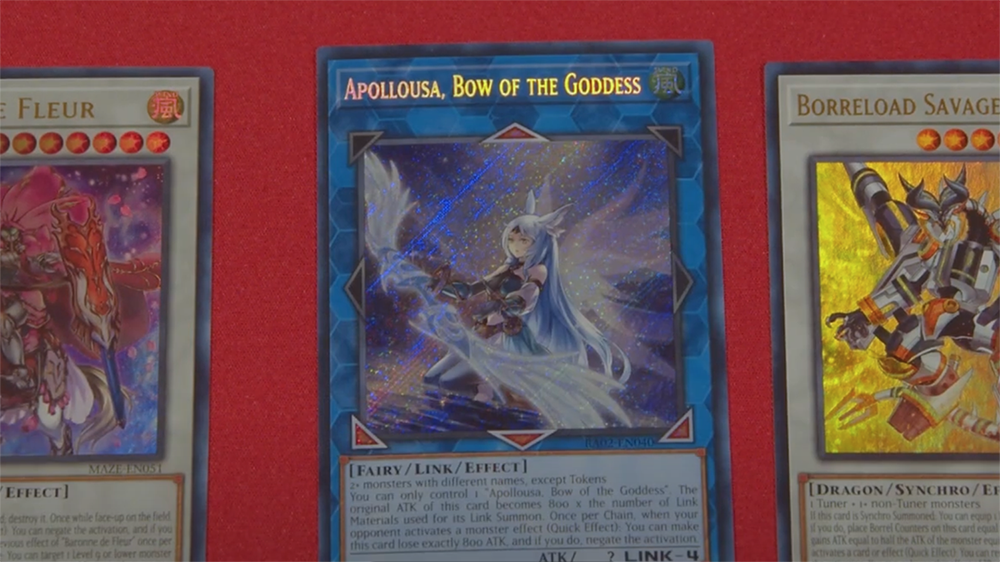 Yugioh playing cards against a red background.