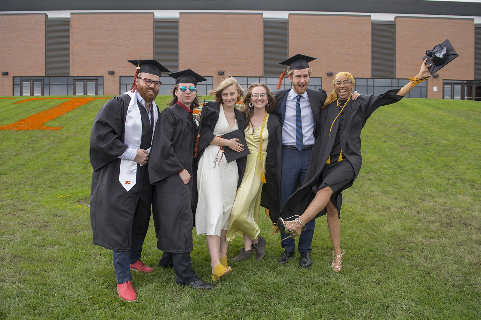 A group of students huge in regalia.
