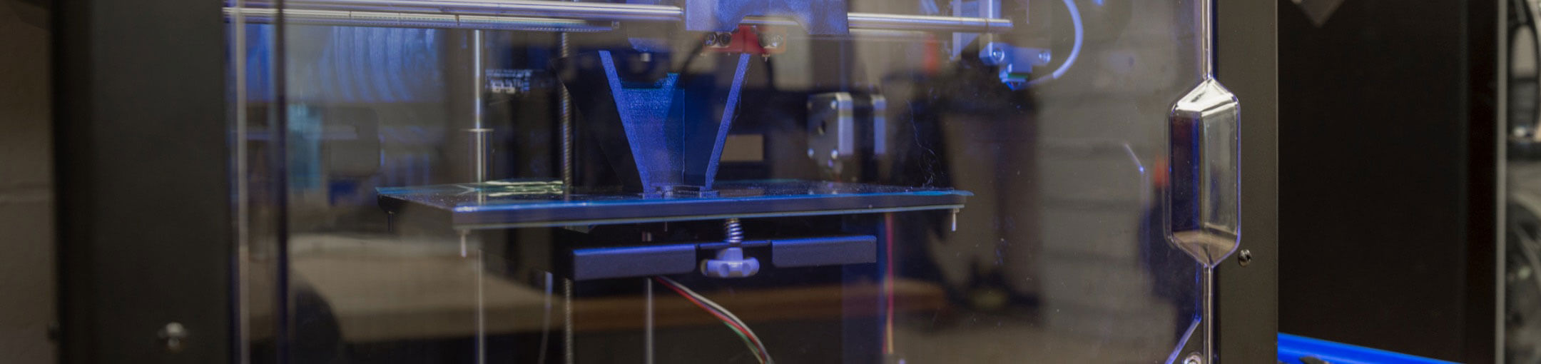 A 3D printer in the middle of printing a 3D model.