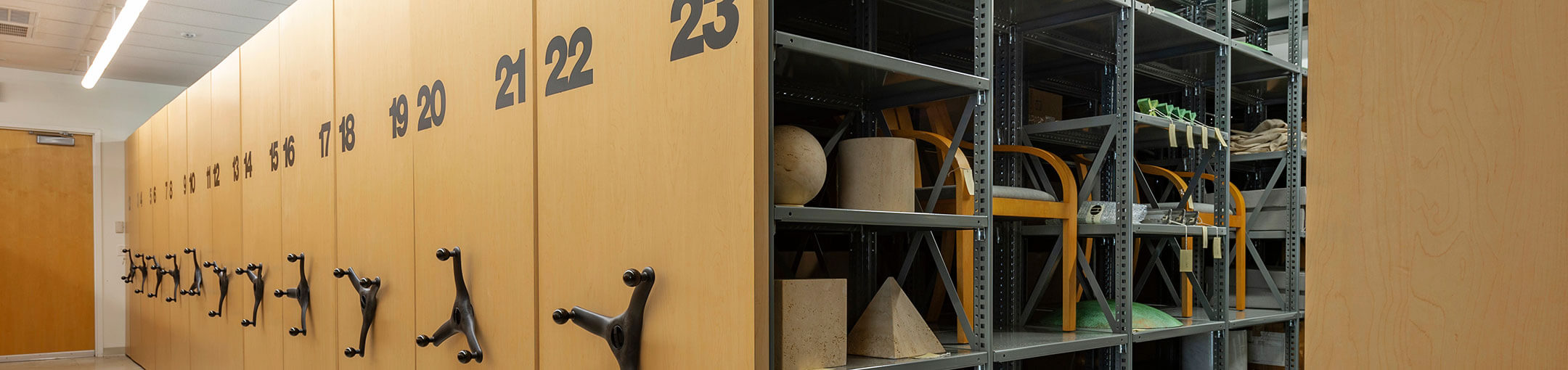 Hangers and shelving units used to store archives.