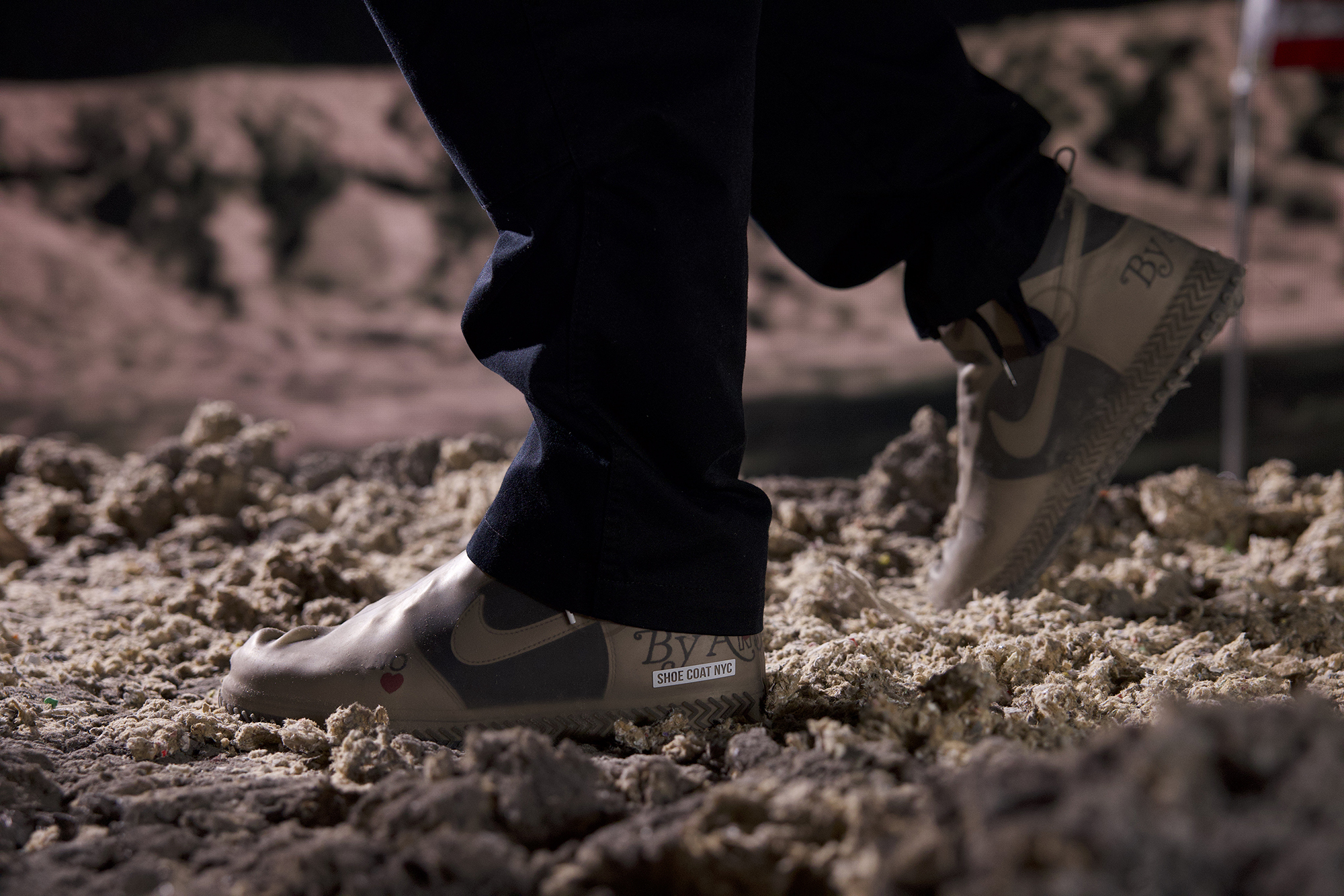 A protective coat over Nike shoes.