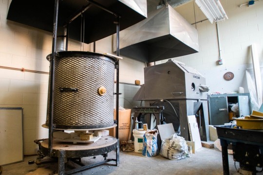 Room with a large kiln and other ceramic machines