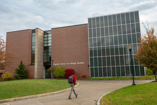 the exterior of the Vignelli Center for Design Studies, a multi-story brick and glass building.
