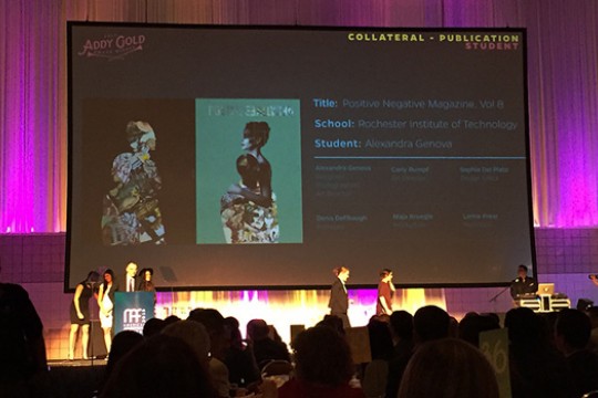 People getting award on stage at event