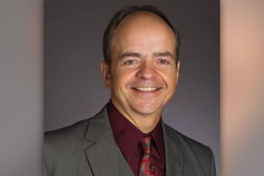 Professor posing for camera