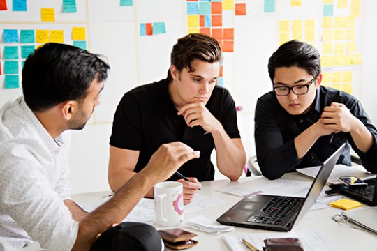 People working on project at table
