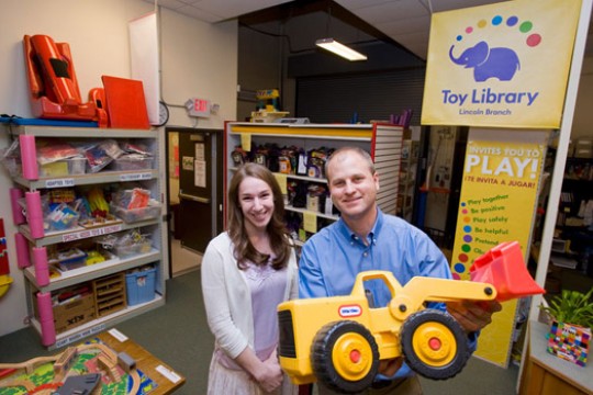 People poising with toys