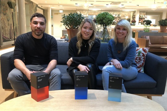 From left, new media design alumni with Google Material Design Awards in Helsinki, Finland: Valentin Drown '11, Emmi Hintz '12 and Linzi Berry '09