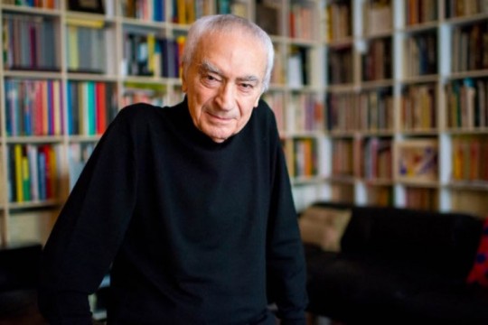 Man wearing black turtleneck sweater.