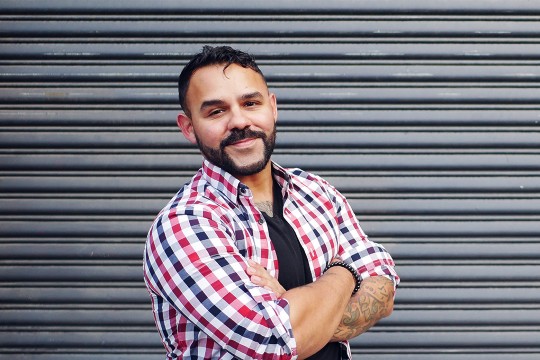 Miguel Cardona headshot