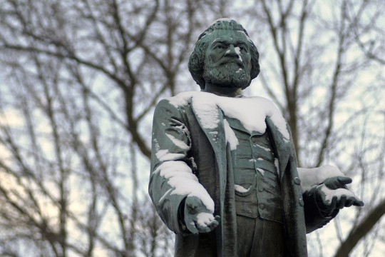 statue of Frederick Douglass in the snow.