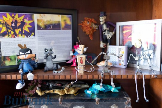 characters for a stop-motion studio sitting on a shelf.