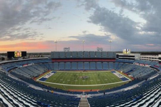 a panoramic view of the Bills stadium in the late afternoon.