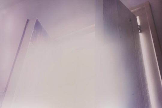 a photograph of a doorway in a haze