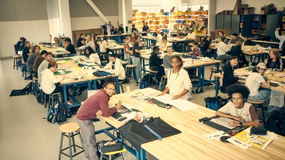 A group of RIT students work during their 2D Design class.