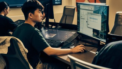 a student uses his computer.