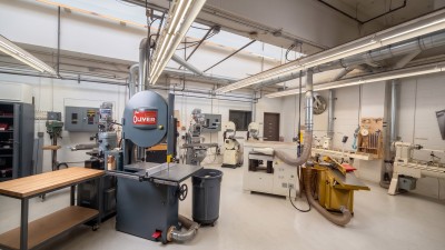 Fabrication room with bandsaws, drill presses, and other equipment