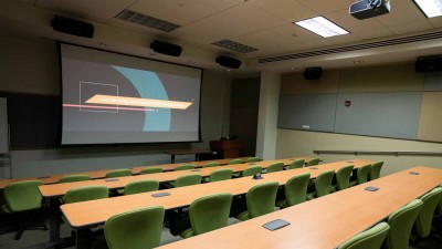 Stadium seating classroom with large projector screen