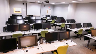 Interior view of the post-production lab, displaying the computers available for use.