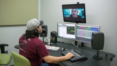 Student editing a video of Deadpool
