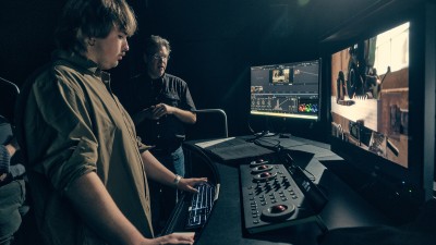An RIT student works the controls in the color correction suite, located in MAGIC Spell Studios.