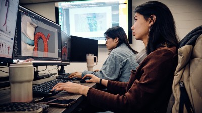 A medical illustration student works on a 3D model.