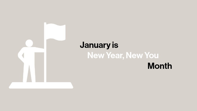 A silhouette of a man holding a flag with text that reads January is New Year, New You Month