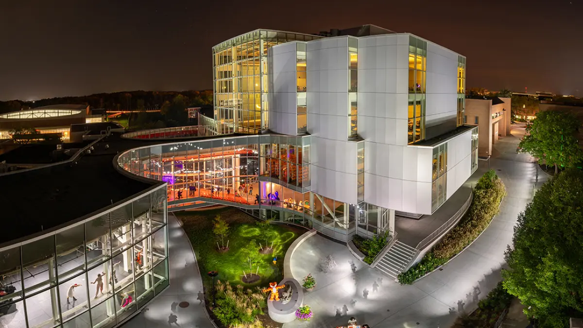 RIT Student Hall for Exploration and Development (SHED) lit up at night