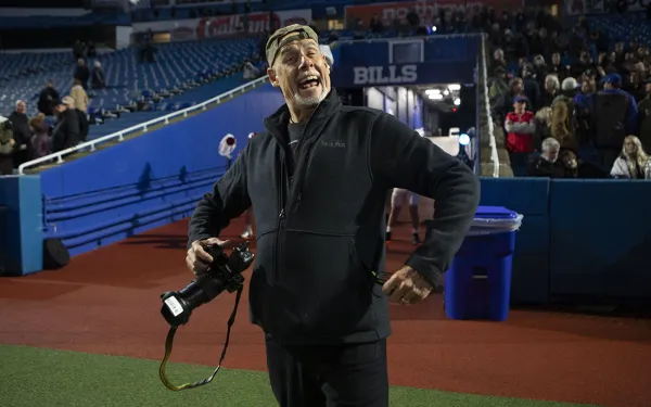 Faculty Jim Porto looking jolly and smiling.