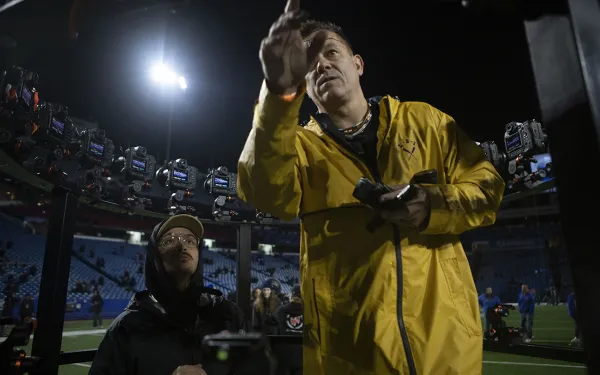 Eric Kunsman adjusts the camera rig.