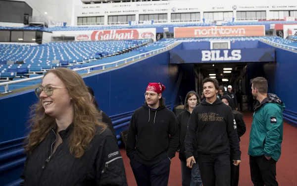Students walk out of the tunnel at Highmark Stadium.  Photo by Rebecca Villagracia '26