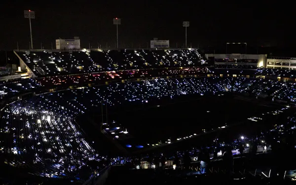 Highmark Stadium all lit up at night. Photo by Rebecca Villagracia '26