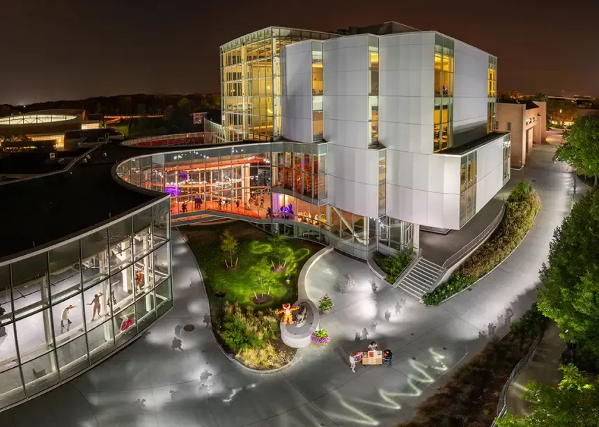 RIT Student Hall for Exploration and Development (SHED) lit up at night