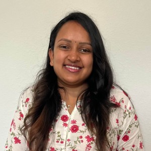 A woman smiling