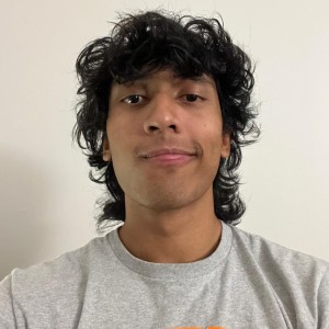 headshot of student in R I T shirt