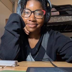 student portrait at a desk