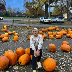 Anika in a pumpkin patch
