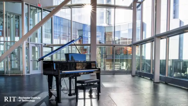 Grand piano in a large glass walled room