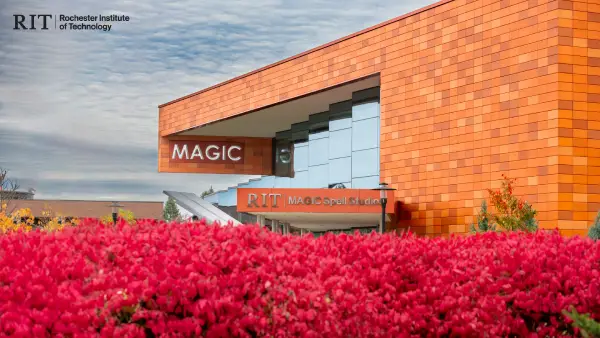 MAGIC building with bright red bushes in front