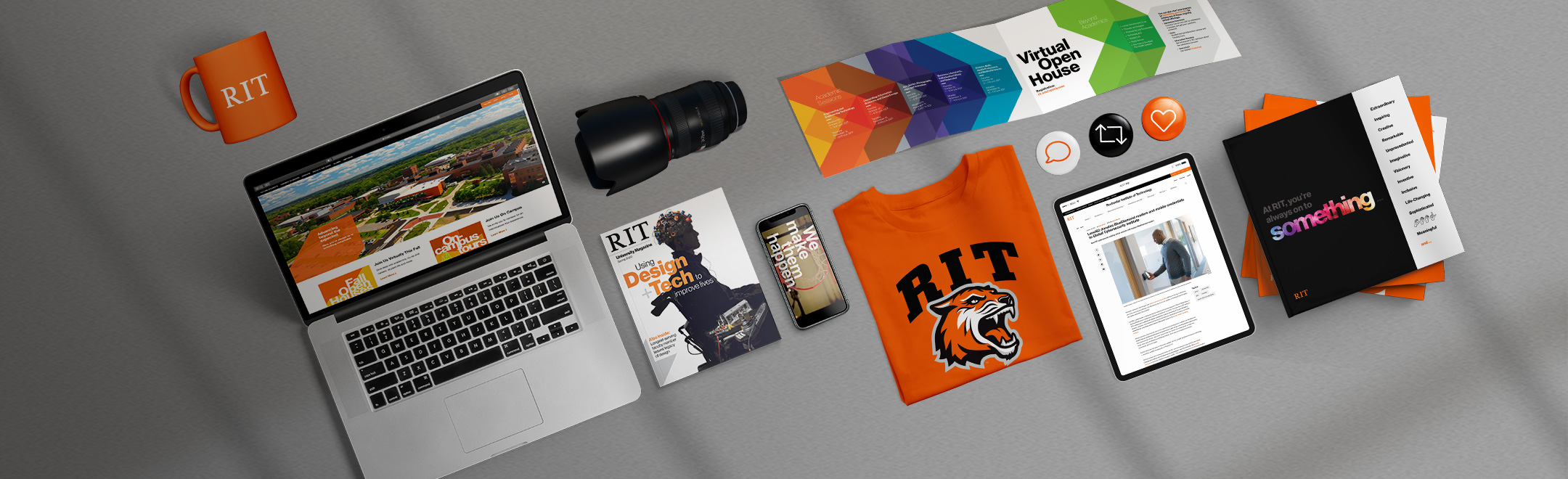 Collage of RIT marketing material on a gray background including a laptop, camera lens, magazine, t-shirt, coffee mug, and notepad
