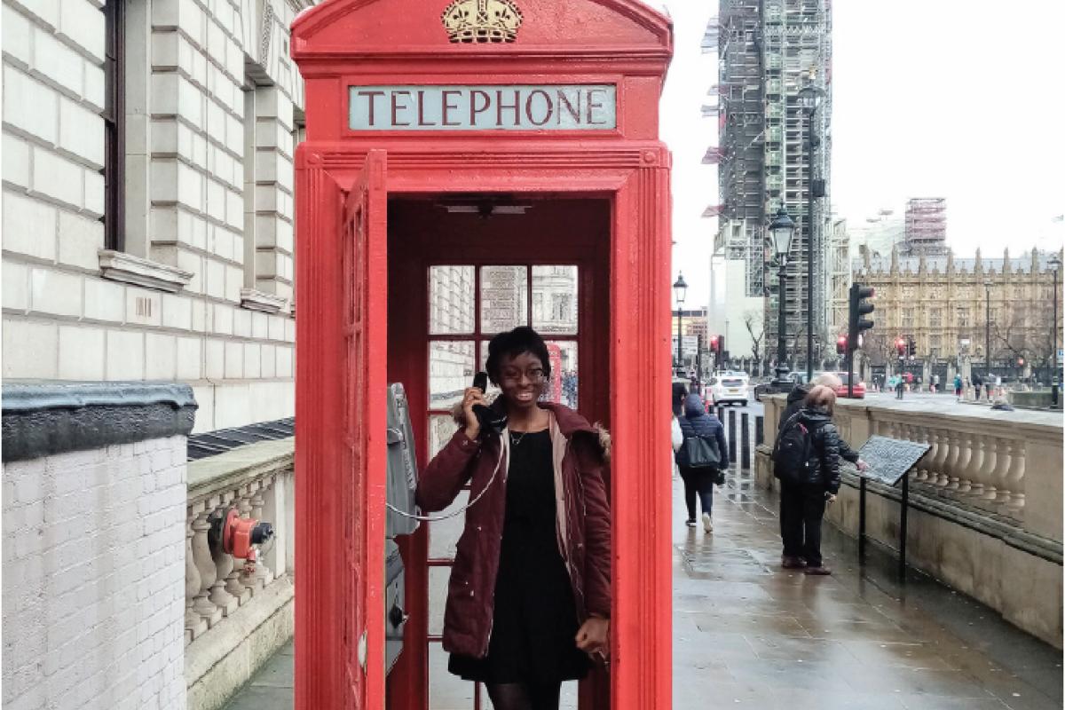 Student in a phone booth