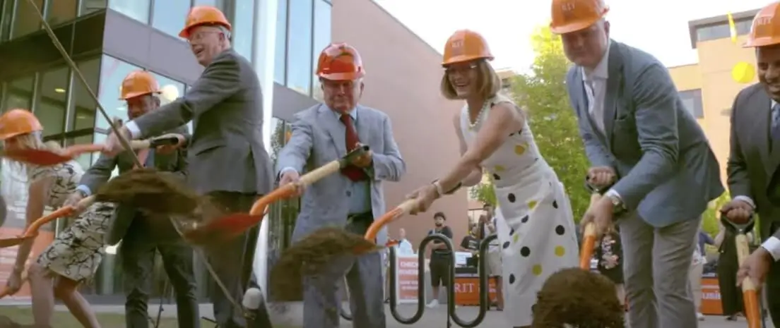 Dr. Munson, E. Philip Saunders, and several other VIPs breaking ground on the expansion to Max Lowenthal Hall.