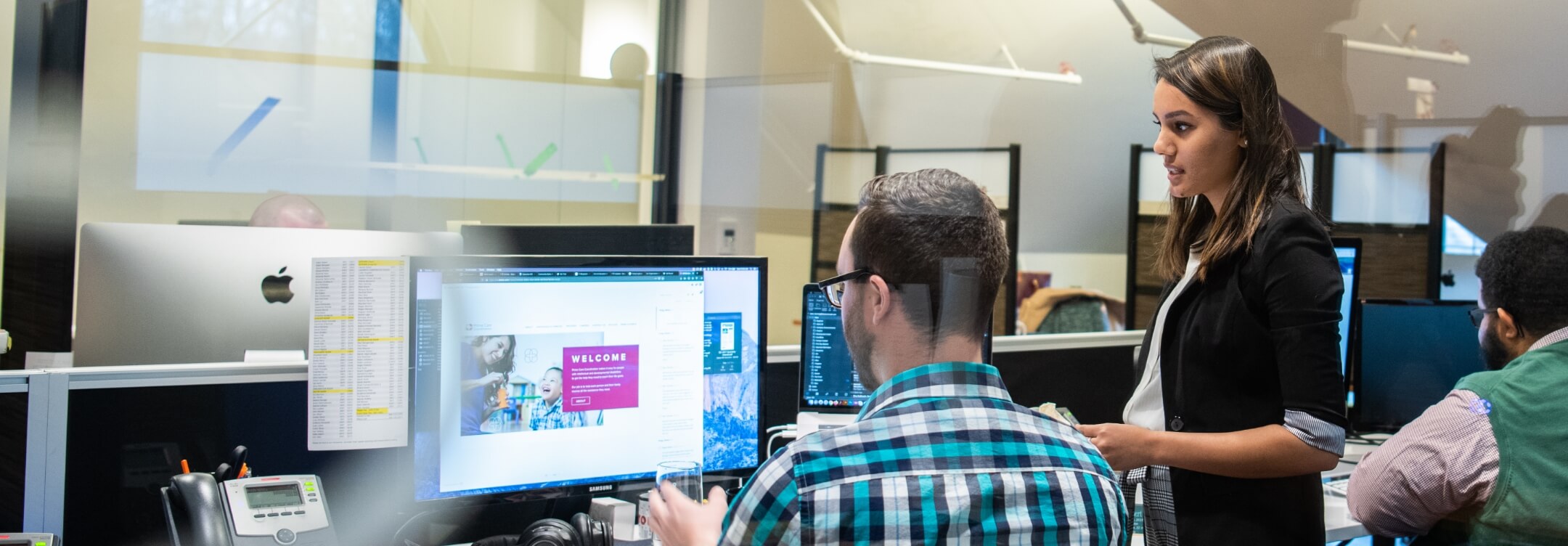 Two people working together in an office