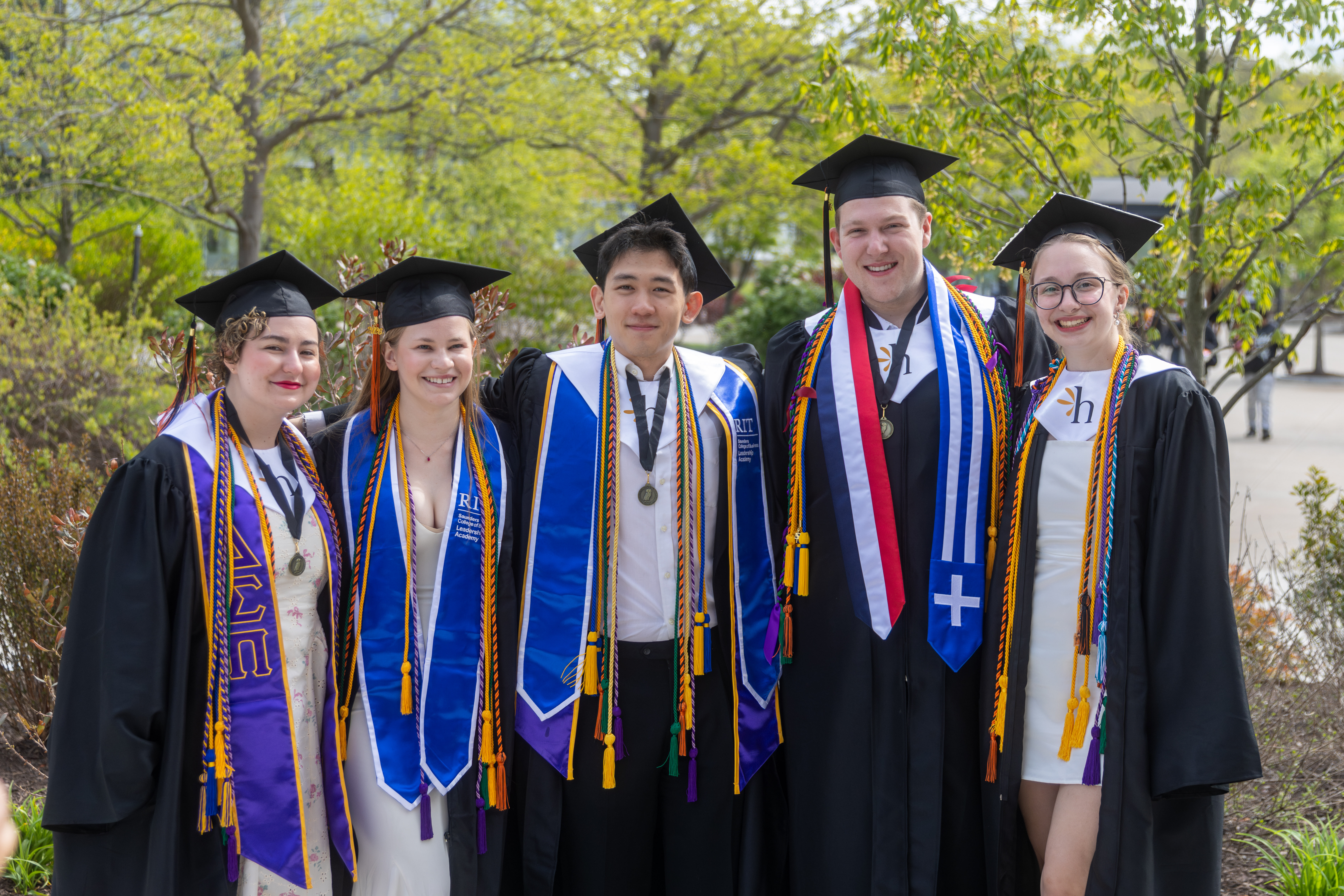 rit graduates taking photos together