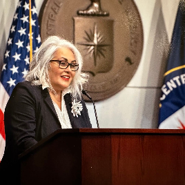 Roynda Hartsfield-Nack speaking on a podium
