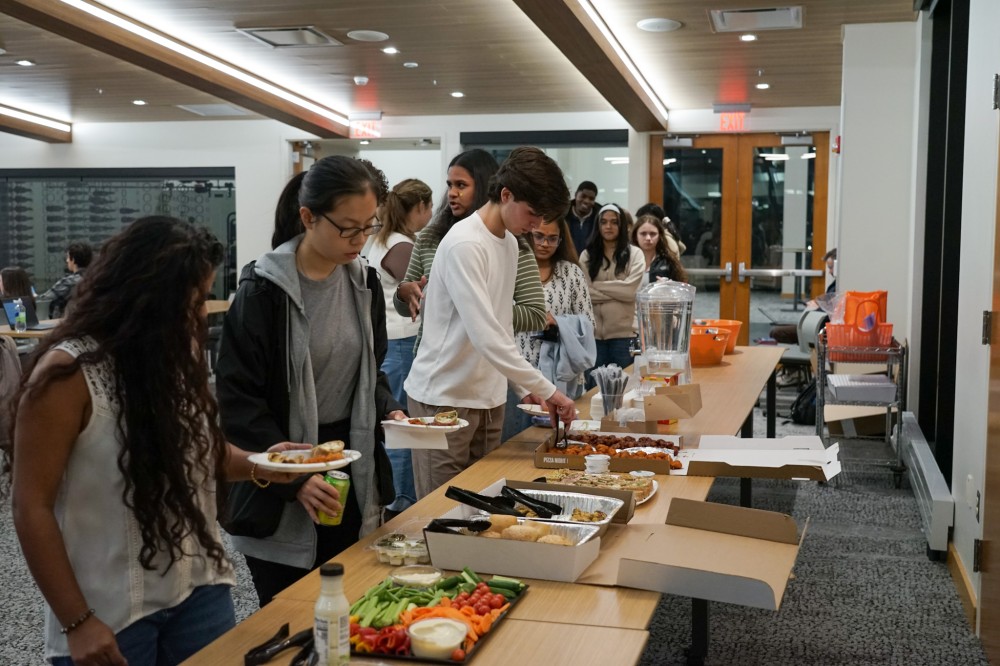 students grabbing food
