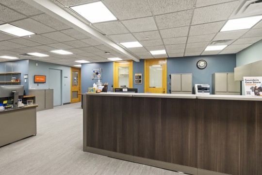 a reception area with a desk.