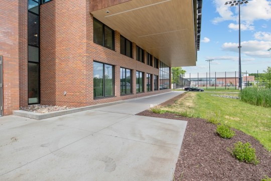 Walter Muench Patio outside of a brick building.