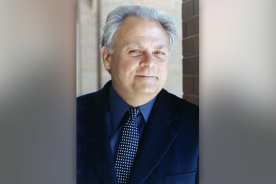 Professor posing for camera